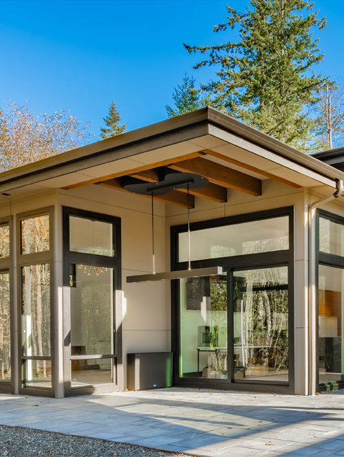 Contemporary black-framed windows installed on a modern home, offering a sleek and elegant appearance.