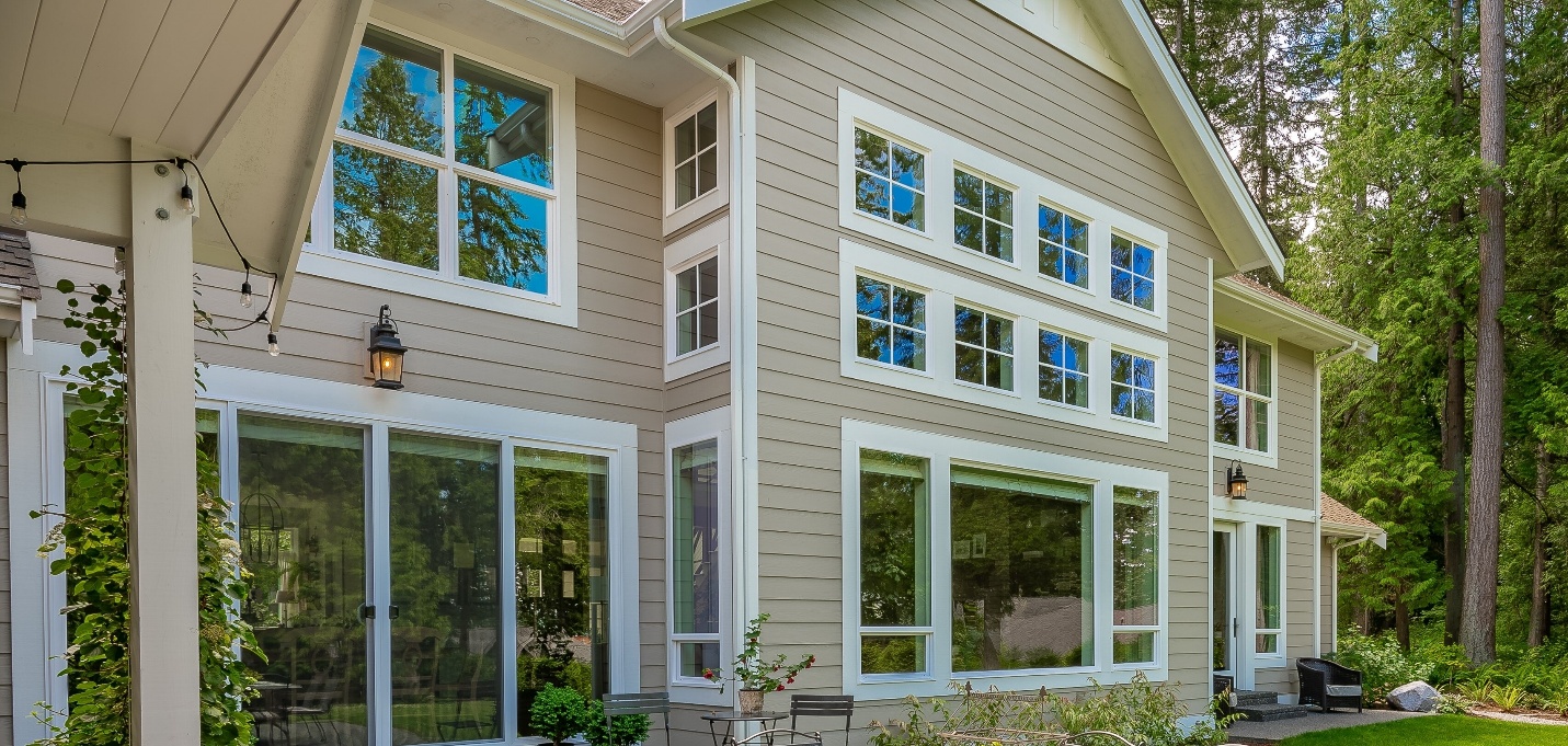 Modern Metro Vancouver home with large white-framed replacement windows