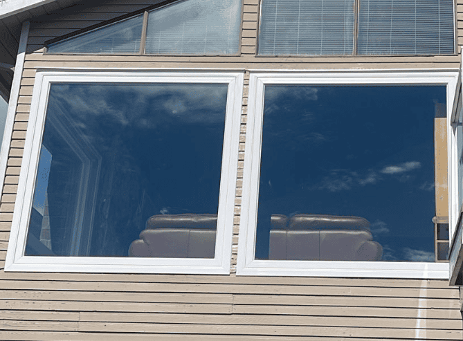 Modern architectural home enhanced by oversized fixed glass windows in Coquitlam home