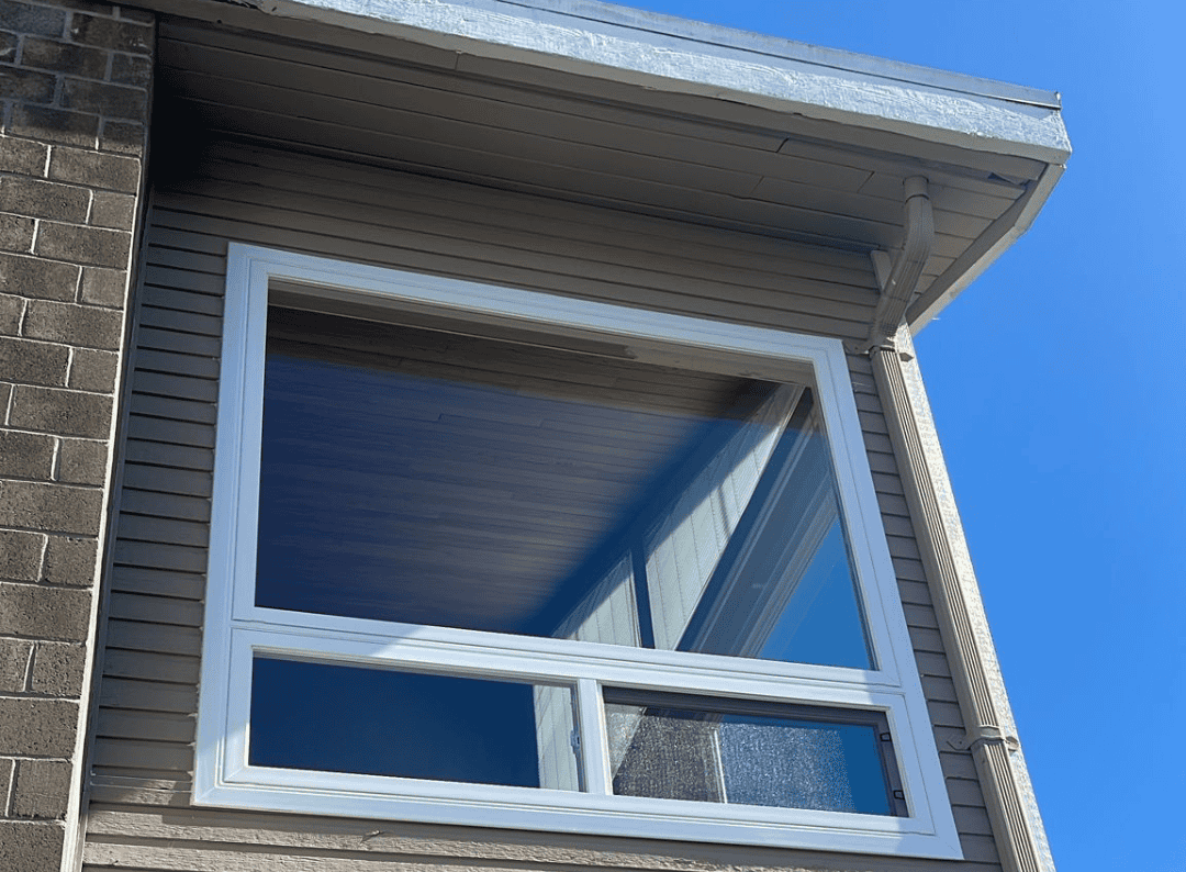 Stylish office space featuring large window for natural light in Coquitlam