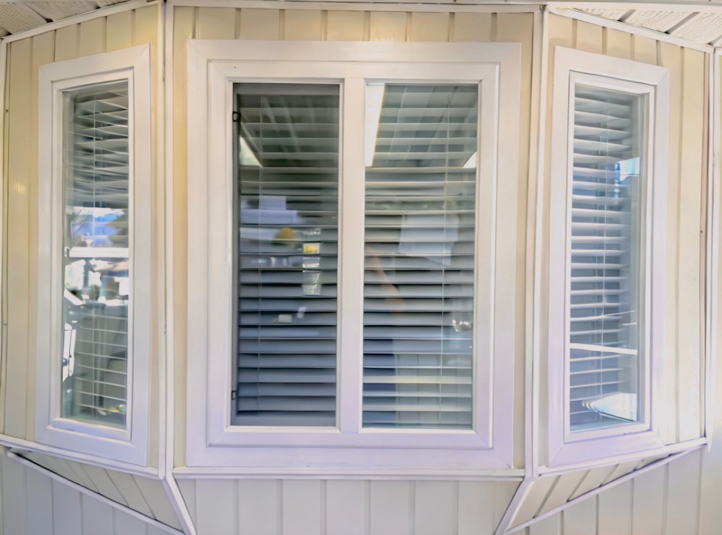White vinyl bay window installed for maximum sunlight in a Coquitlam home