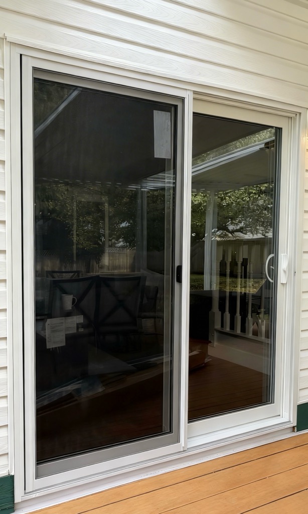 Big patio door installed for the easy entrance & maximum sunlight in a family home in Pitt Meadows