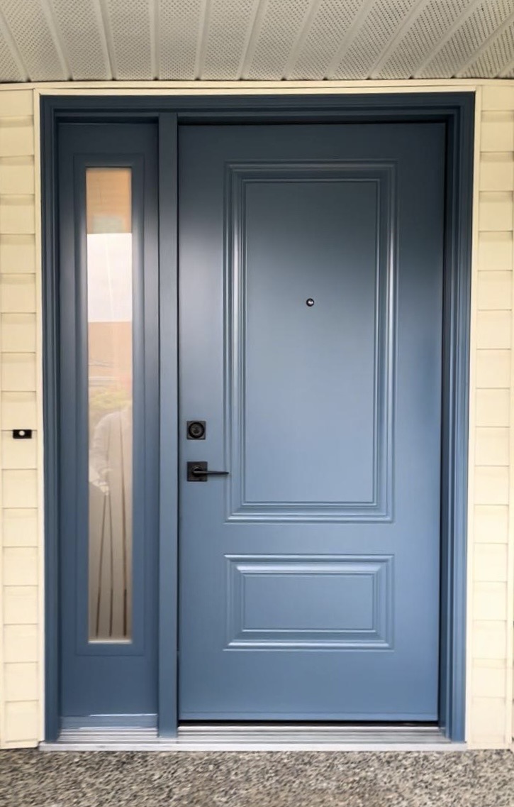 Steel single entry door with sidelite features custom blue colour in Coquitlam, BC home