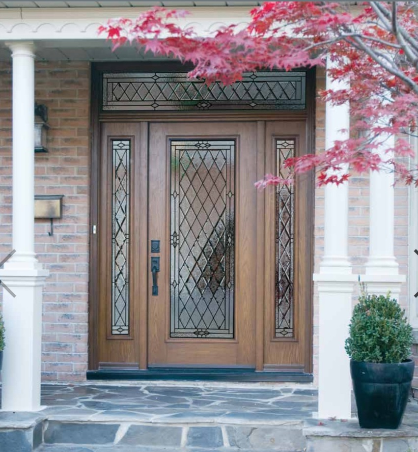 Modern fiberglass door with woodgrain pattern enhancing West Vancouver curb appeal