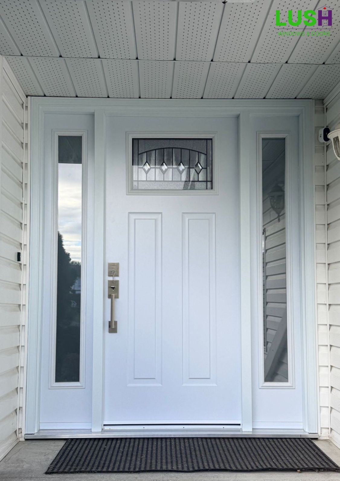 Shaker-style Victoria entry door featuring sidelights and glass panel