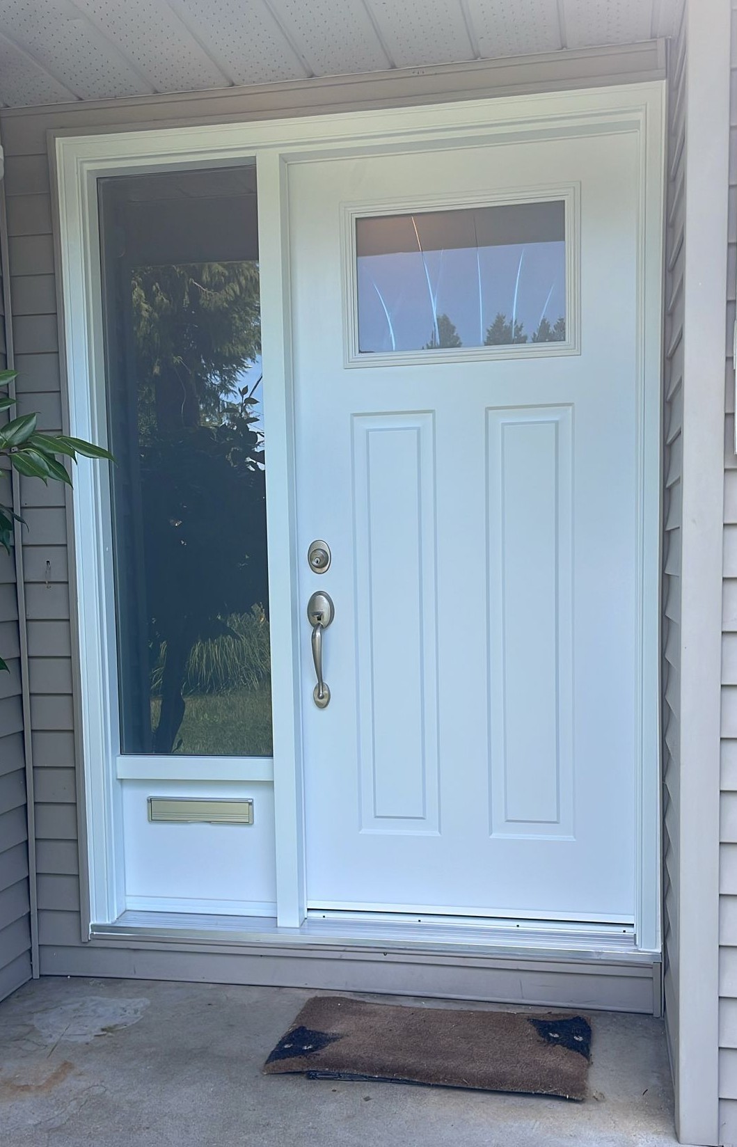 Burnaby home upgrade: custom white front door with integrated mail slot